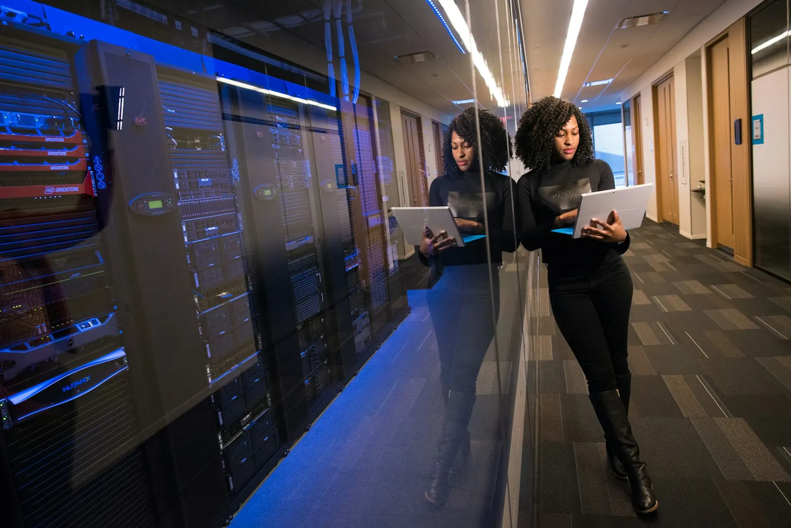 Server racks in a data centre running supply chain systems
