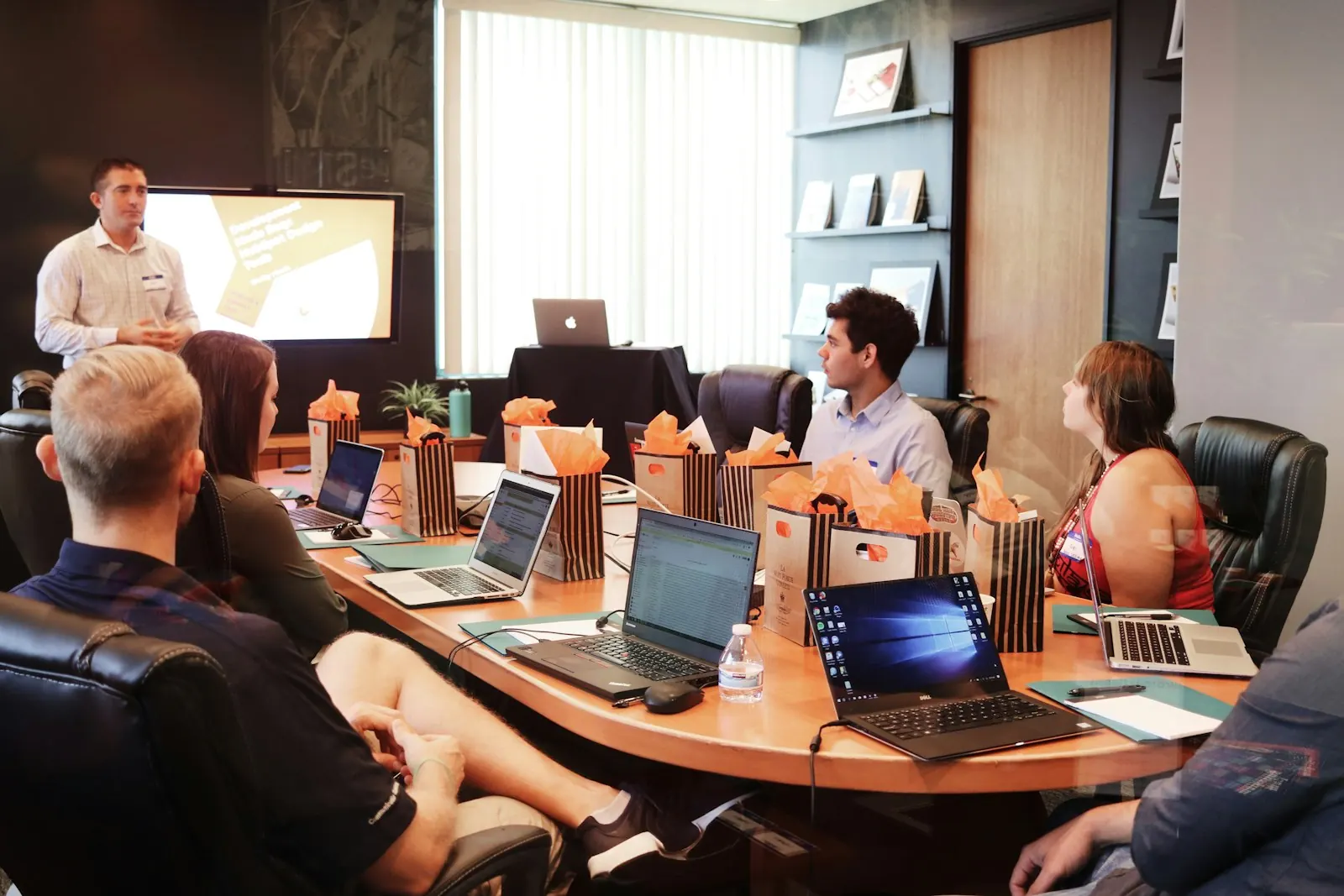 Nexera leadership team reviewing supply chain strategy in a boardroom session